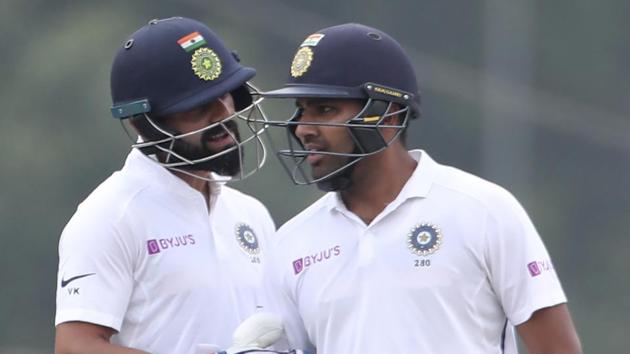 India skipper Virat Kohli speaks to Rohit Sharma during Ranchi Test. (AP) India skipper Virat Kohli speaks to Rohit Sharma during Ranchi Test. (AP)