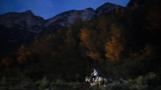Farmer Jonuz Jonuzi, 70, rides his horse on the banks of the Vjosa in the Kelcyre Gorge. He raised his children here and now watches his grandchildren play in the Vjosa’s waters. “Everything I have, I have because of the river,” he said. “Albania needs electrical energy. But not by creating one thing and destroying another. Why do such damage that will be irreparable for life, that future generations will blame us for what we’ve done?” (Felipe Dana / AP)