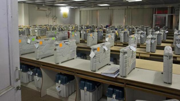 Cases containing electronic voting machines sit in a strong room before the beginning of vote counting.(AP Photo)