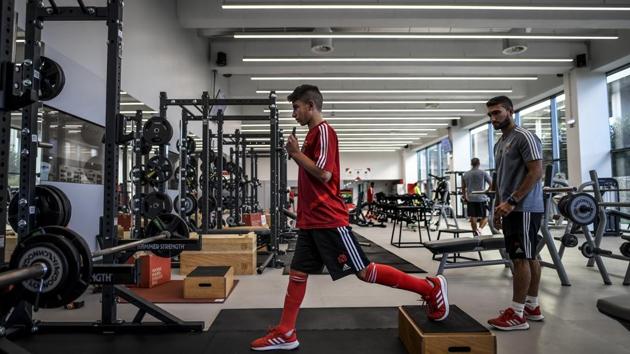 A player attends a gym training session. “The demands at all levels are very high to give the young players the best possible chance of reaching the professional team,” says Rodrigo Magalhaes, technical coordinator of the training centre. Yet the club’s focus now is to “move up a gear,” Bruno Lage said. “We must be able to hold on to our young gems to become more competitive.” (Patricia De Melo Moreira / AFP)