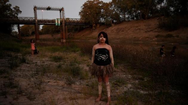 Ngiyaampaa aboriginal Punta Williams on the dry riverbed before performing at Yaama Ngunna Baaka Corroboree Festival on the banks of the Darling River in Wilcannia, New South Wales, Australia. The parched earth of Australia’s longest waterway, if tributaries are included, is in the grip of the continent’s most severe drought in a century. (Tracey Nearmy / REUTERS) Ngiyaampaa aboriginal Punta Williams on the dry riverbed before performing at Yaama Ngunna Baaka Corroboree Festival on the banks of the Darling River in Wilcannia, New South Wales, Australia. The parched earth of Australia’s longest waterway, if tributaries are included, is in the grip of the continent’s most severe drought in a century. (Tracey Nearmy / REUTERS)