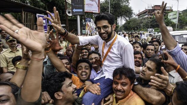 Shiv Sena party workers lift party leader Aditya Thackeray after he was declared the winner from Worli constituency in Mumbai. The first in their family to contest elections, Thackeray won by a margin of over 65,000 votes. (Anshuman Poyrekar/HT Photo) Shiv Sena party workers lift party leader Aditya Thackeray after he was declared the winner from Worli constituency in Mumbai. The first in their family to contest elections, Thackeray won by a margin of over 65,000 votes. (Anshuman Poyrekar/HT Photo)