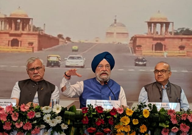 Hardeep S Puri (c), MoS Housing & Urban Affairs addressed a press conference on Development/Redevelopment of Parliament building, Common Central Secretariat at Airports Authority Of India Officer institute in New Delhi(Biplov Bhuyan/ HT Photo)