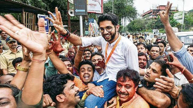 Senior sena party leaders lifts Shiv Sena Leader Aditya Thackeray after winning his first assembly election from Worli in Mumbai. (Anshuman Poyrekar/Hindustan Times) Senior sena party leaders lifts Shiv Sena Leader Aditya Thackeray after winning his first assembly election from Worli in Mumbai. (Anshuman Poyrekar/Hindustan Times)