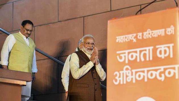 Prime Minister Narendra Modi arrives to address his supporters after the party's victory in both Haryana and Maharashtra Assembly polls, at BJP HQ, in New Delhi.(PTI)