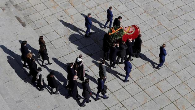 Late Spanish dictator Francisco Franco’s relatives carry his coffin out of the Basilica of The Valle de los Caidos (The Valley of the Fallen) in San Lorenzo de El Escorial, Spain during a reinternment near Madrid to a city cemetery where Franco’s wife is buried. (Emilio Naranjo / Pool via REUTERS)