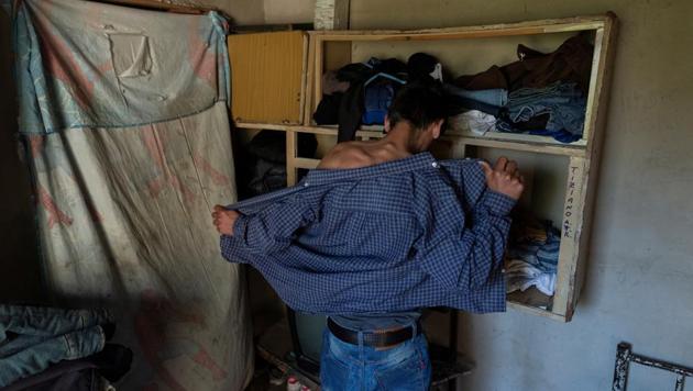 Cristian Molina, 26, prepares to go to church in Buenos Aires, Argentina. In a poor Buenos Aires suburb, Molina’s jeans and denim jacket hide his unhealthily slight frame, his legacy from years of a poor diet that left him susceptible to the tuberculosis infection he contracted earlier this year, a disease of poverty that is making a comeback in Argentina. (Magali Druscovich / REUTERS) Cristian Molina, 26, prepares to go to church in Buenos Aires, Argentina. In a poor Buenos Aires suburb, Molina’s jeans and denim jacket hide his unhealthily slight frame, his legacy from years of a poor diet that left him susceptible to the tuberculosis infection he contracted earlier this year, a disease of poverty that is making a comeback in Argentina. (Magali Druscovich / REUTERS)