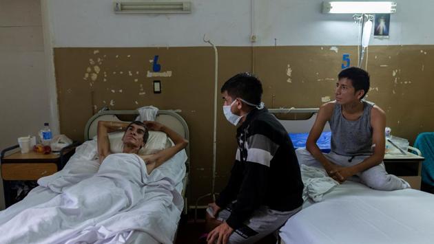 Lucas (C), 24, a former tuberculosis patient, visits patients Jorge (L), 40, and Arturo Maldonado, 25, who have both been hospitalised for tuberculosis in Muniz public hospital in Buenos Aires. Farm-rich Argentina is still better off than some of its South American neighbors, including Brazil and Peru where incidence of the disease is higher. But the infection rate in Argentina is rising worrisomely. (Magali Druscovich / REUTERS) Lucas (C), 24, a former tuberculosis patient, visits patients Jorge (L), 40, and Arturo Maldonado, 25, who have both been hospitalised for tuberculosis in Muniz public hospital in Buenos Aires. Farm-rich Argentina is still better off than some of its South American neighbors, including Brazil and Peru where incidence of the disease is higher. But the infection rate in Argentina is rising worrisomely. (Magali Druscovich / REUTERS)