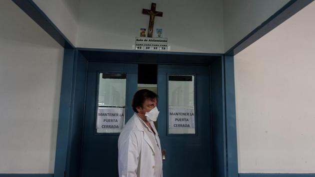 Dr. Decarolis, who specialises in patients with HIV and tuberculosis, visits patients that have been hospitalised in isolation. Doctors said the rise was straining some hospital wards where patients with TB are being treated. Patricia Figueroa, a social worker at the Muniz public hospital, said the facility was struggling with overcrowding, which she described as “a record in recent history.” (Magali Druscovich / REUTERS) Dr. Decarolis, who specialises in patients with HIV and tuberculosis, visits patients that have been hospitalised in isolation. Doctors said the rise was straining some hospital wards where patients with TB are being treated. Patricia Figueroa, a social worker at the Muniz public hospital, said the facility was struggling with overcrowding, which she described as “a record in recent history.” (Magali Druscovich / REUTERS)