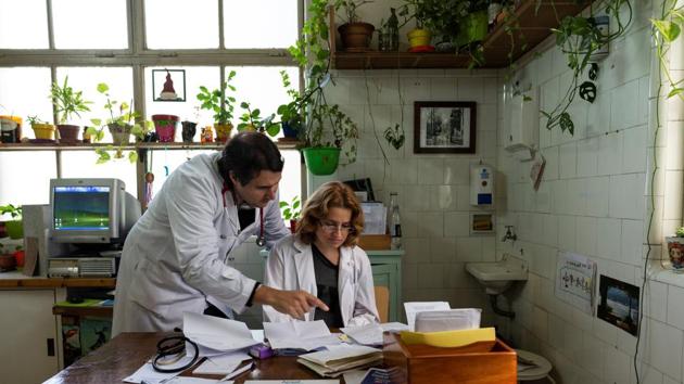 Dr. Laura Lagrutta (R) and Dr. Nicolas Castiglioni, both pulmonologists, who specialise in children with tuberculosis, talk inside Lagrutta's consultation room at Dr. Raul Vaccarezza Institute in Buenos Aires. "Tuberculosis is the collateral damage of poverty," said Lagrutta. (Magali Druscovich / REUTERS) Dr. Laura Lagrutta (R) and Dr. Nicolas Castiglioni, both pulmonologists, who specialise in children with tuberculosis, talk inside Lagrutta's consultation room at Dr. Raul Vaccarezza Institute in Buenos Aires. "Tuberculosis is the collateral damage of poverty," said Lagrutta. (Magali Druscovich / REUTERS)