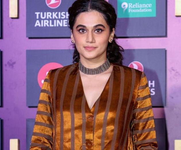 Tapsee Pannu poses for photographs as she attends the opening ceremony of Jio MAMI 21st Mumbai Film Festival in Mumbai. (PTI)