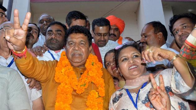 BJP’s Gian Chand Gupta celebrating his victory in Panchkula.