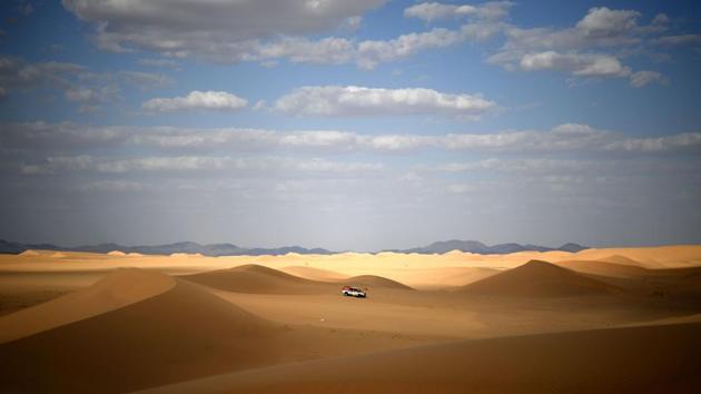 Dakar rally manager of the road book Pablo Eli and sports coordinator Edo Mossi drive in Saudi Arabia during the recce for the next Dakar 2020 that will kick off on January 5 in Jeddah and will run until January 17. (Franck Fife / AFP)