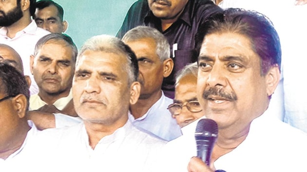 INLD leader and general secretary Ajay Singh Chautala addressing workers in Jhajjar district.(Manoj Dhaka/ HT file photo)