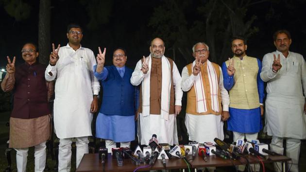 Home Minister Amit Shah, BJP Working President JP Nadda, party leader Anil Jain, Haryana Chief Minister Manohar Lal Khattar, MoS Finance Anurag Thakur and JJP leader Dushyant Chautala during a press conference announcing their alliance in Haryana assembly, in New Delhi. (Kamal Singh / PTI) Home Minister Amit Shah, BJP Working President JP Nadda, party leader Anil Jain, Haryana Chief Minister Manohar Lal Khattar, MoS Finance Anurag Thakur and JJP leader Dushyant Chautala during a press conference announcing their alliance in Haryana assembly, in New Delhi. (Kamal Singh / PTI)