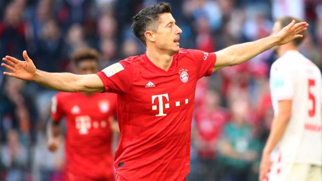 Bayern Munich's Robert Lewandowski celebrates scoring their second goal.(REUTERS)