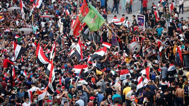 “We’re here to bring down the whole government -- to weed them all out!” one protester said, the Iraqi tricolour wrapped around his head. Government officials including Prime Minister Adel Abdel Mahdi and parliament speaker Mohammed Al-Halbussi have suggested more than a dozen reforms, but demonstrators seem unimpressed. “We don’t want a single one of them. Not Halbussi, not Abdel Mahdi. We want to bring down the regime,” the protester said. (Thaier Al-Sudani / REUTERS)