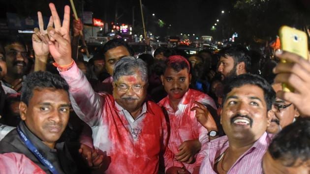 Among the probables from the city to get berths in the cabinet are Bharatiya Janata Party state unit chief Chandrakant Patil. (In photo) Patil during celebrations after results of assembly polls.(HT/PHOTO)