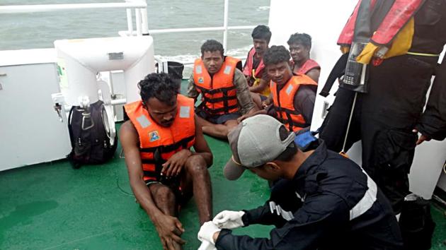 Indian Coast Guards after rescuing people as cyclone 'Kyarr' hits the western coast, in Mangaluru on Saturday. (ANI Photo) Indian Coast Guards after rescuing people as cyclone 'Kyarr' hits the western coast, in Mangaluru on Saturday. (ANI Photo)