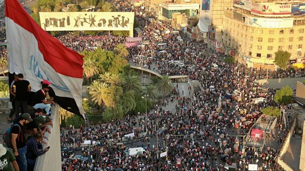 Anti-government protesters gather in Tahrir square during a demonstration in Baghdad.(AP Photo)