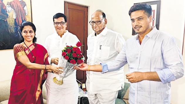 (From left) Supriya Sule, NCP leader; Balasaheb Thorat, Congress party’s state unit president; Sharad Pawar, NCP chief; Rohit Pawar, newly-elected MLA from Karjat-Jamkhed, in Baramati on Saturday. (ANI Photo)