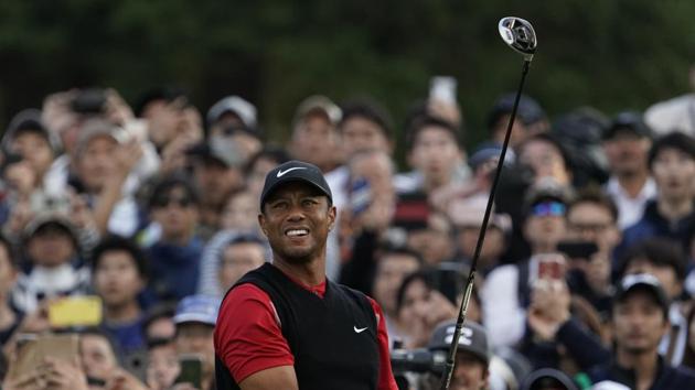 Tiger Woods of the United States watches his tee shot.(AP)