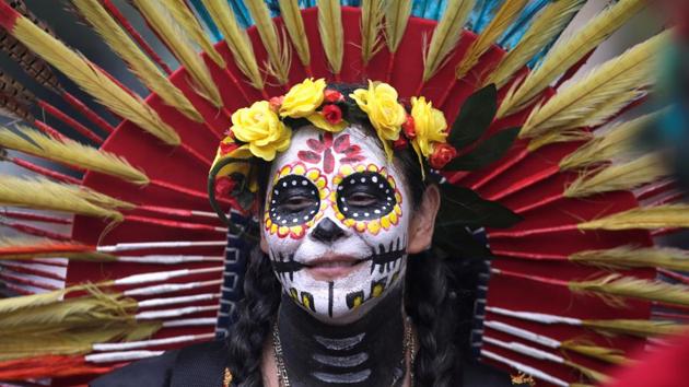 A woman dressed as a Catrina take part in a Catrina parade ahead of Day of the Dead in Monterrey, Mexico. (REUTERS)