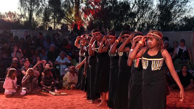Indigenous Anangu perform a traditional dance during a ceremony marking the permanent ban. “I think it is important that mother nature has a bit of a break,” the last climber at Uluru, James Martin, said. “I would like to say to the Aboriginals that we are sorry and the world does indeed belong to every single person who was born on the planet,” the Australian told reporters as he came off the rock. (Saeed Khan / AFP)