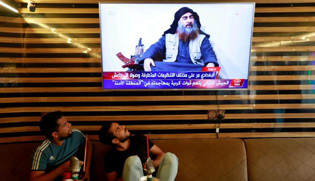 Iraqi youth watch the news of Islamic State leader Abu Bakr al-Baghdadi death, in Najaf, Iraq October 27, 2019. (REUTERS FILE) Iraqi youth watch the news of Islamic State leader Abu Bakr al-Baghdadi death, in Najaf, Iraq October 27, 2019. (REUTERS FILE)