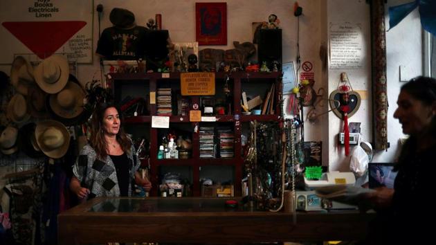 Judith Perez talks to a colleague in the charity shop Give a Little. Perez, who was born in Spain but has lived in Britain since she was a child, worries that Brexit would diminish the opportunities for younger British people who might want to study and work in other European countries. She said several of her friends had left the city for Berlin, Barcelona and Spain since the referendum. (Hannah McKay / REUTERS)