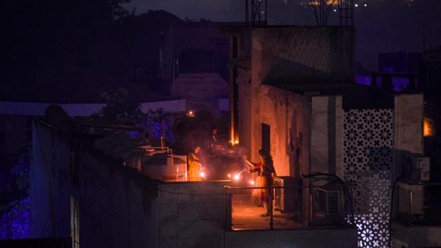 Crackers can be burst only between 8pm and 10pm on Diwali, according to Supreme Court guidelines. The top court had in 2018 banned polluting firecrackers and ordered that only green firecrackers can be manufactured and sold. (Amal KS / HT Photo)