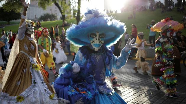 People take part in a Catrina parade ahead of Day of the Dead in Monterrey. (REUTERS)