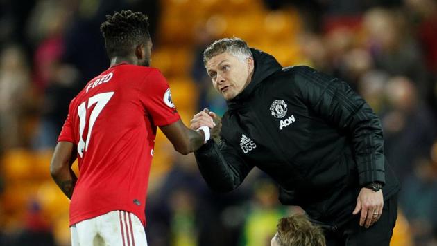 Manchester United manager Ole Gunnar Solskjaer shakes hands with Fred after the match. (Action Images via Reuters)