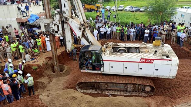 Sujith Wilson fell into the borewell, dug up by his father, while playing near his house on Friday evening (PTI) Sujith Wilson fell into the borewell, dug up by his father, while playing near his house on Friday evening (PTI)