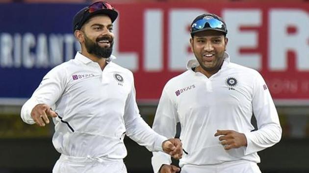 Virat Kohli with teammate Rohit Sharma.(PTI)