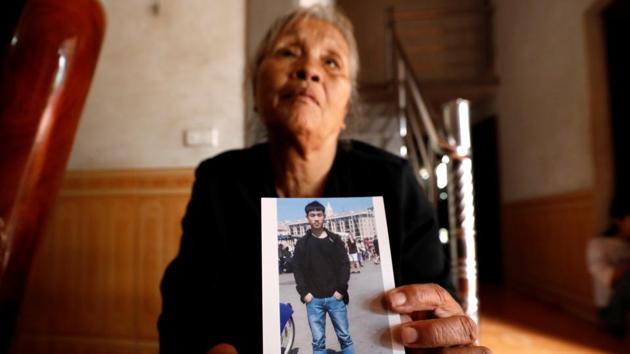 Anna Tran Thi Giao, grandmother of Joseph Nguyen Dinh Luong at her home. Journeys made by Vietnamese migrants are often broken up into stages, at the end of which traffickers request cash from families before they can proceed further. When Luong travelled to Germany, his father was asked to pay $18,000 in cash for the trip so far. (Kham / REUTERS)