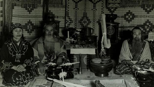 (L-R) Tosa Monna, her husband and her husband’s brother attend a traditional ceremony in Asahikawa between 1945-1950. Scholars say the Ainu settled in Japan’s northernmost island and across Sakhalin, Russia, by the 1300s. They hunted, fished, practiced an animist religion and spoke a language unrelated to any other. (Mai Hachiya via REUTERS)