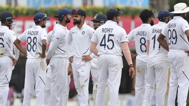 India's captain Virat Kohli, fifth left, reacts after losing a review.(AP)