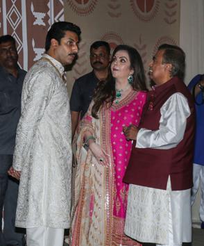 Abhishek Bachchan with Nita and Mukesh Ambani (PTI) Abhishek Bachchan with Nita and Mukesh Ambani (PTI)