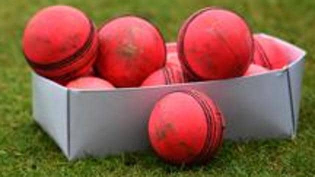 A box of used pink cricket balls are pictured on the pitch.(AFP)