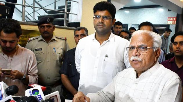 Haryana Chief Minister Manohar Lal Khattar speaks during a press conference after a meeting as Deputy Chief Minister Dushyant Chautala looks on, at Haryana Bhawan in New Delhi. (HT Photo) Haryana Chief Minister Manohar Lal Khattar speaks during a press conference after a meeting as Deputy Chief Minister Dushyant Chautala looks on, at Haryana Bhawan in New Delhi. (HT Photo)