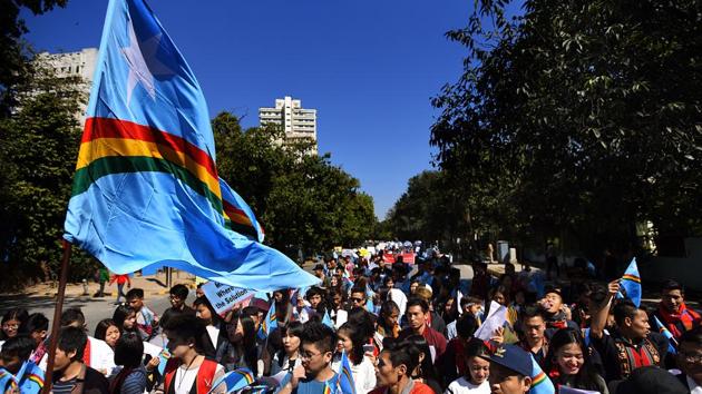 People rally with the Nagalim flag in New Delhi on February 23, 2019. Ravi, in a statement, said last week that a mutually agreed draft comprehensive settlement, including all the substantive issues and competencies, is ready for signing the final agreement but the NSCN(IM) had adopted a “procrastinating attitude” on issues which they were aware of the government of India’s position. (Amal KS / HT Archive)