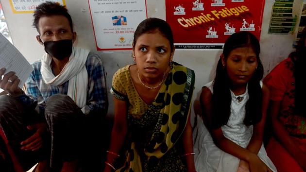Patients wait for their turn to get their daily dose of medicine at a DOTS centre in New Delhi. Campaigners said the trial in Kenya, South Africa and Zambia, involving more than 3,000 adults, was a crucial step amid a push for more funding for TB research. (Money Sharma / AFP)