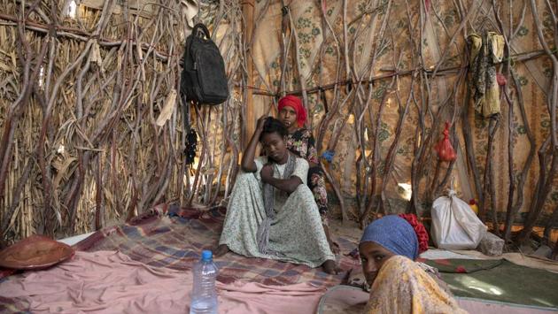 With its systematic torture, Ras al-Ara is a particular hell on the arduous, 1,400 kilometre journey from the Horn of Africa to oil-rich Saudi Arabia. Migrants leave home on sandaled feet with dreams of escaping poverty. They trek through mountains and deserts, sandstorms and 45 degree Celsius temperatures, surviving on crumbs of bread and salty water from ancient wells. (Nariman El-Mofty / AP)