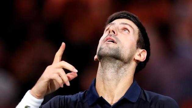 Serbia's Novak Djokovic celebrates winning his quarter final match against Greece's Stefanos Tsitsipas.(REUTERS)