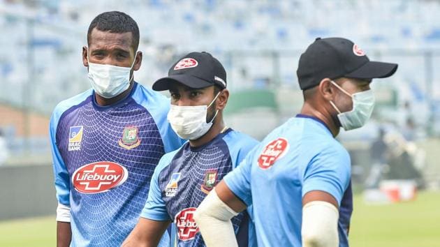 Bangladeshi cricketers Al-Amin Hossain, Liton Das and Abu Hider Rony, wearing masks to protect themselves from air-pollution, during a practice session at Arun Jaitley Stadium in New Delhi. (PTI)