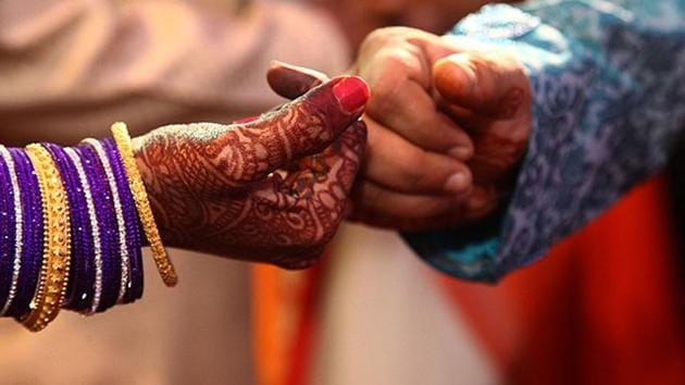 The woman in her complaint to police said that a week into her marriage, her in-laws had started harassing her for more dowry while her husband insulted her saying he did not like her because of her ugly teeth. (Representative image/Shutterstock) The woman in her complaint to police said that a week into her marriage, her in-laws had started harassing her for more dowry while her husband insulted her saying he did not like her because of her ugly teeth. (Representative image/Shutterstock)