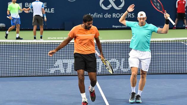 Rohan Bopanna of India and Denis Shapovalov of Canada during the Rogers Cup.(Getty Images)