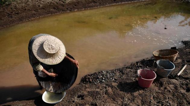 A Thai man gold panning along the Mekong River. Eyler said the lower part of the river is at a “crisis point” until rains come again next year but no one is sounding the alarm. The Mekong, which rises on the Tibetan plateau and courses through China, Myanmar, Laos, Thailand, Cambodia and Vietnam -- sustains tens of millions of people along its banks through fishing and agriculture. (Lillian Suwanrumpha / AFP)