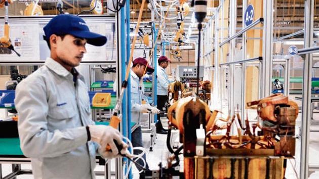 A man is seen working at the Panasonic India’s manufacturing facility at Jhajjar in Haryana. (Priyanka Parashar) A man is seen working at the Panasonic India’s manufacturing facility at Jhajjar in Haryana. (Priyanka Parashar)
